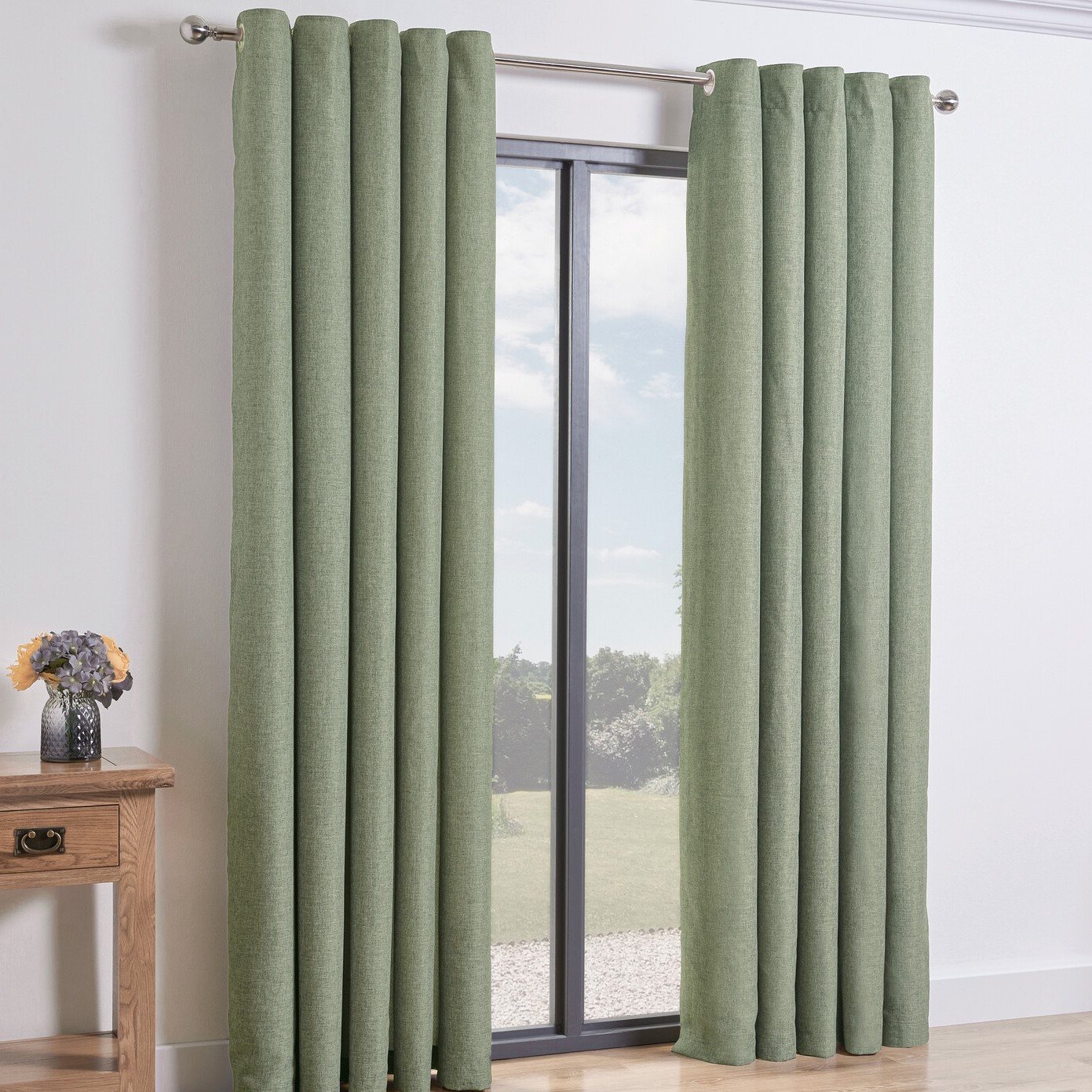 Taylor Blackout Eyelet Curtains Green 229cm Image