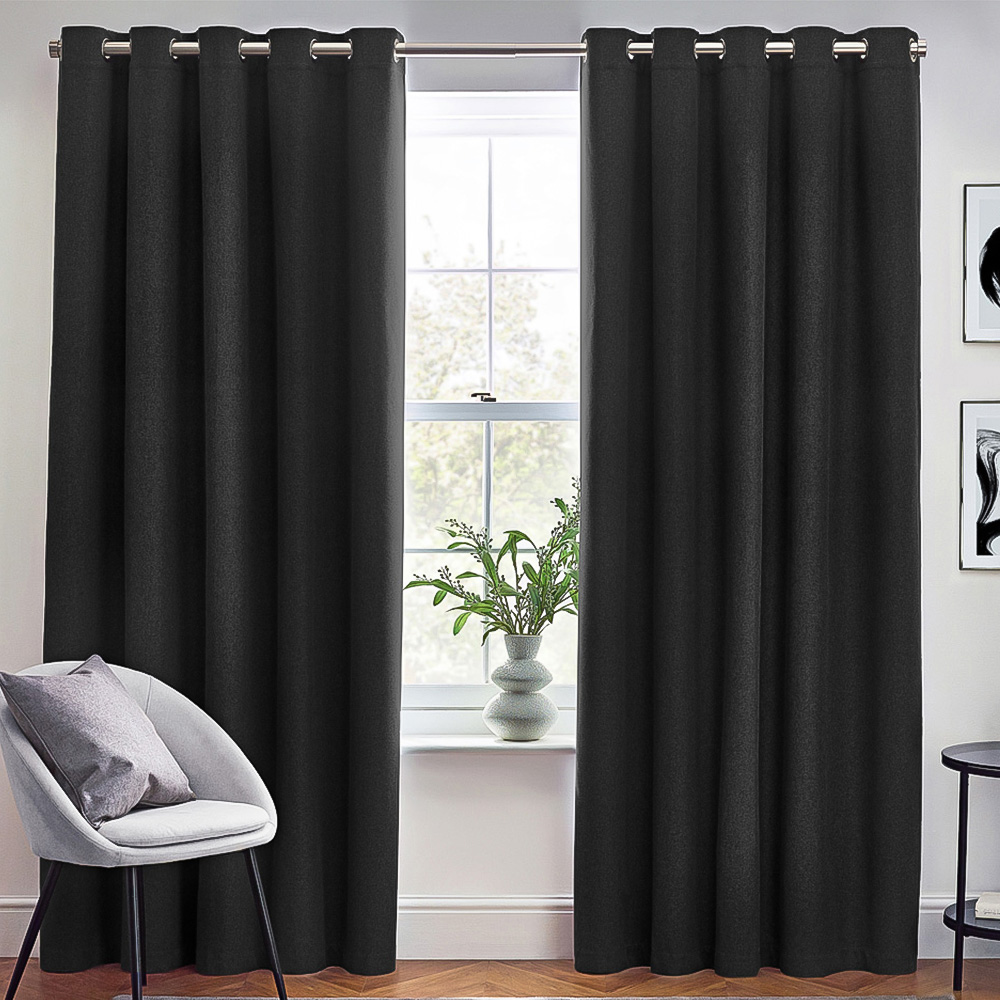 furn. Dawn Black Textured Blackout Eyelet Curtains 229 x 183cm Image 1