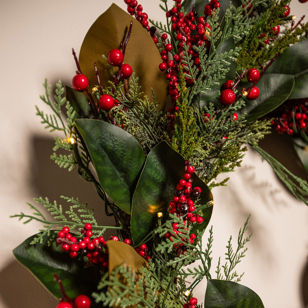 The Christmas Centre 50 Warm White LED Pre-Lit Magnolia Berry Wreath 66cm Image 5